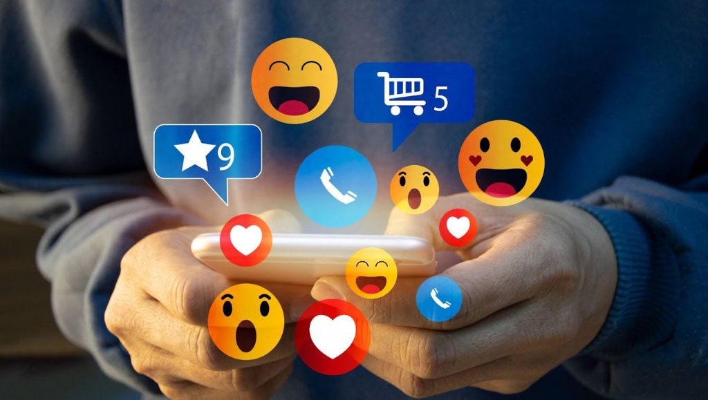 Social media and online digital concept, man using smart phone with social media icons